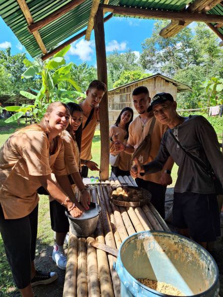 A group in matching shirts making elephant treats - lifeonwheel.com