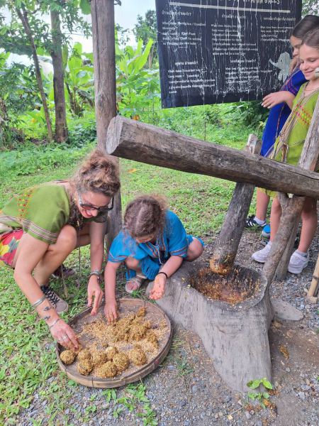 A mother and daughter rolling elephant medicine balls - lifeonwheel.com