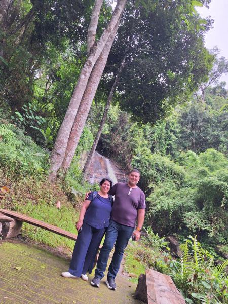 A couple resting at the viewing platform above the falls - lifeonwheel.com